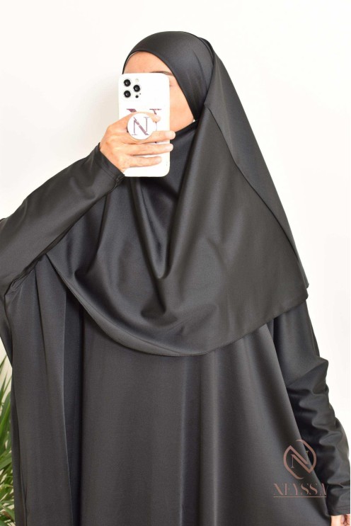 Black burkini with integrated swim khimar, loose-fitting and water-resistant