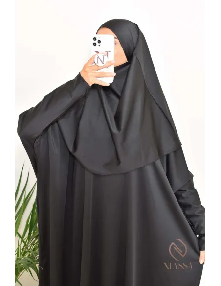 Black burkini with integrated swim khimar, loose-fitting and water-resistant