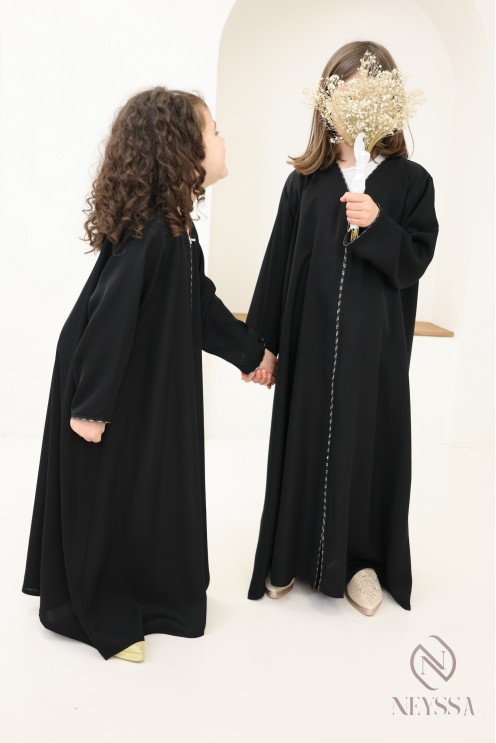 Black flared Dubai abaya, modest mother-daughter outfit idea for Eid