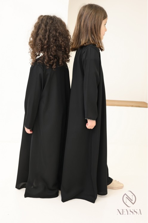 Black flared Dubai abaya, modest mother-daughter outfit idea for Eid