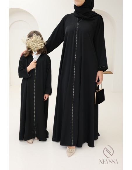 Black flared Dubai abaya, modest mother-daughter outfit idea for Eid