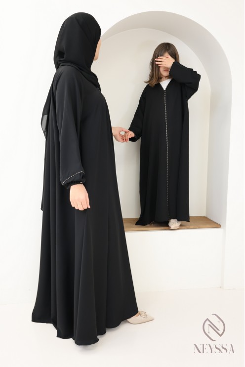 Black flared Dubai abaya, modest mother-daughter outfit idea for Eid