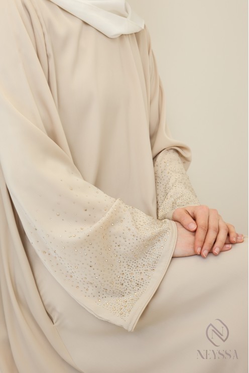Flared abaya with rhinestone sleeves, an elegant yet modest outfit Eid