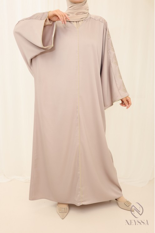 Abaya nude für verschleierte Damen mit modernen goldenen Stickereien