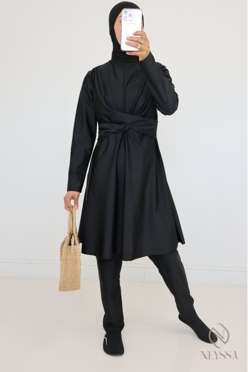 Veiled woman black burkini, long tunic, pants and integrated hood