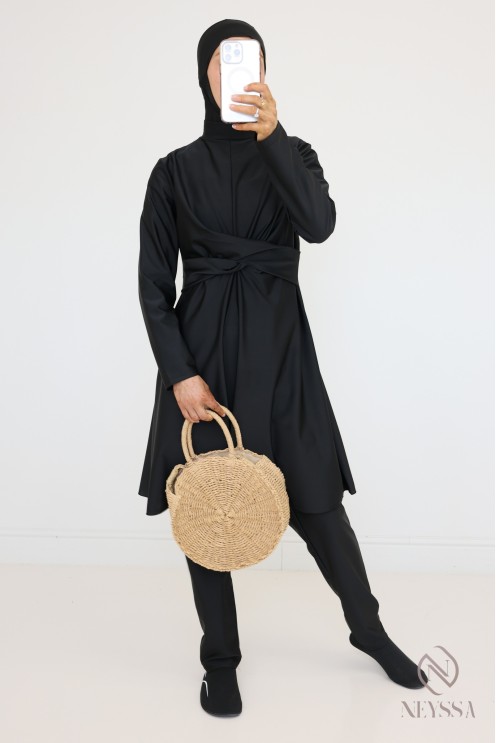Veiled woman black burkini, long tunic, pants and integrated hood