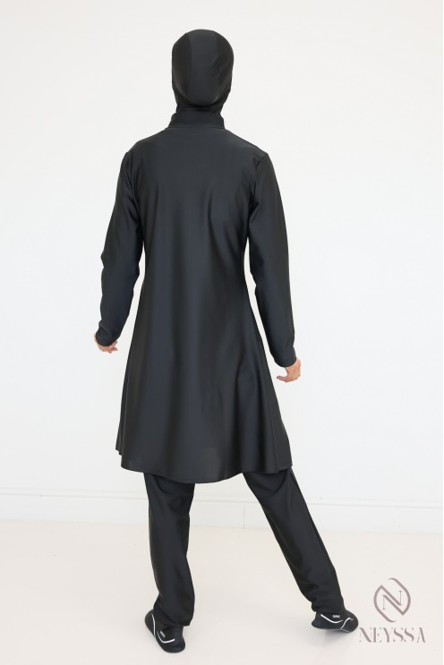 Veiled woman black burkini, long tunic, pants and integrated hood