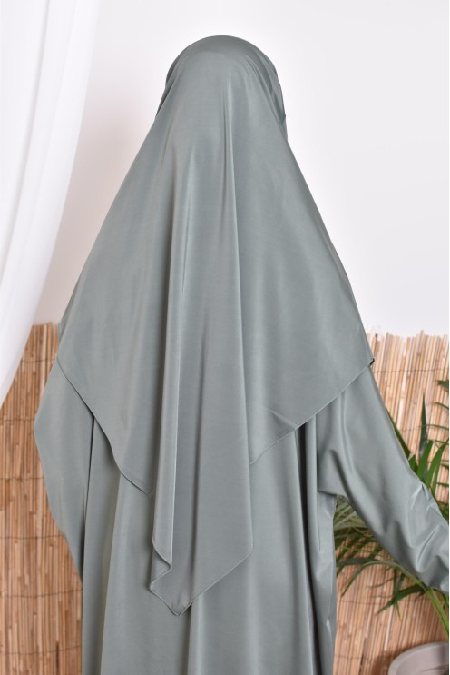 Badejilbab mit Khimar, Kleid und integrierter Badehose, ideal zum Baden.