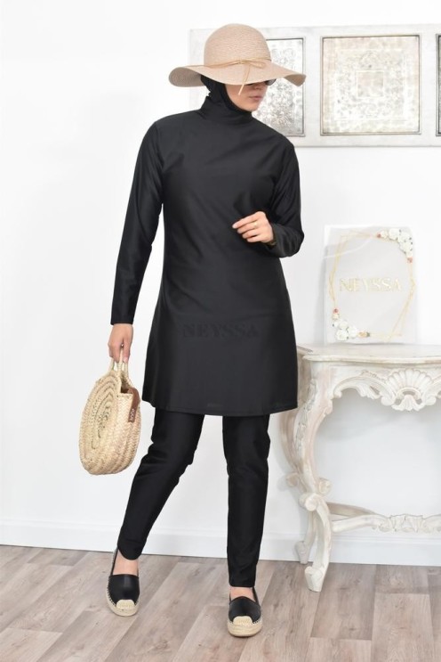 Modest long flared burkini for Muslim women who wear the veil