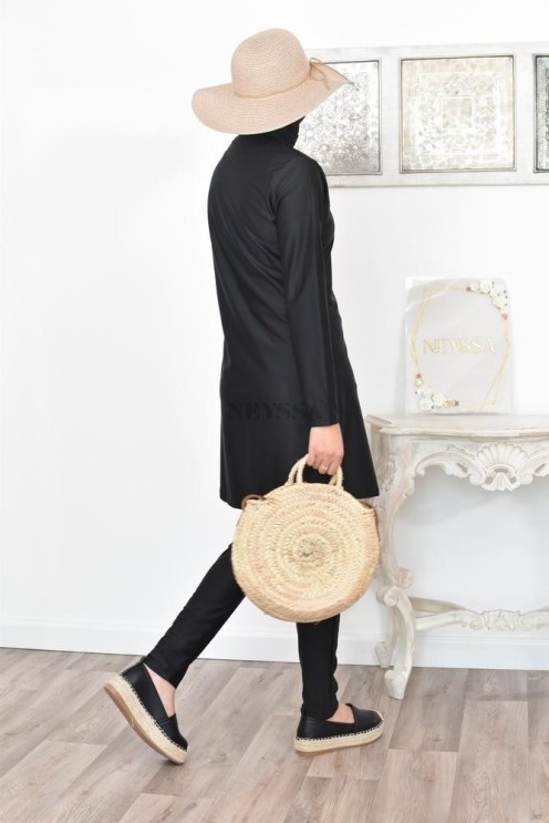 Modest long flared burkini for Muslim women who wear the veil