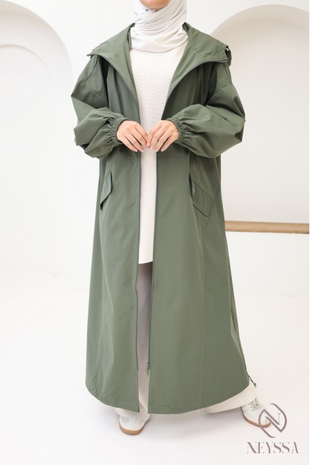 Modern oversized women's parka coat with pockets and large hood