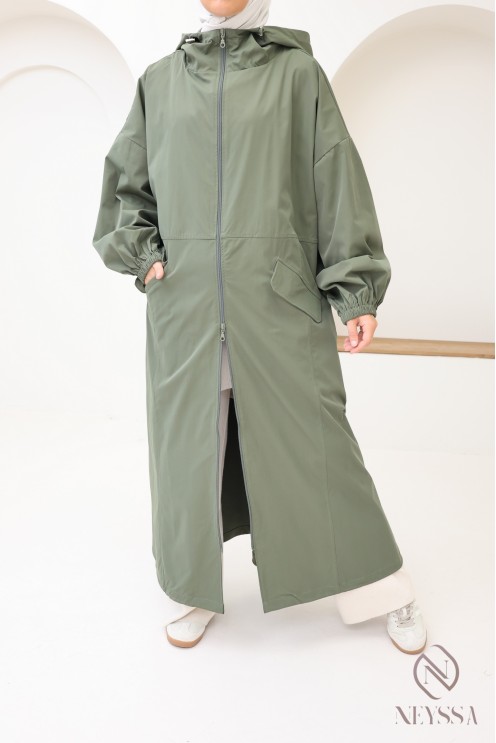 Modern oversized women's parka coat with pockets and large hood