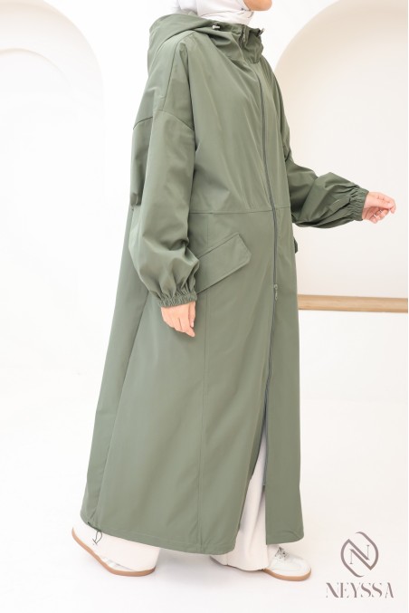 Modern oversized women's parka coat with pockets and large hood