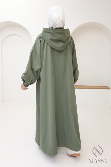 Modern oversized women's parka coat with pockets and large hood