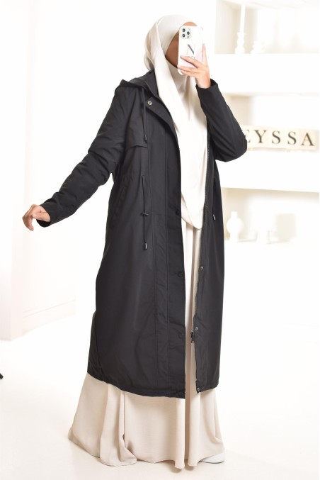 Longue parka noire doublée fourrure, chaude et confortable pour l'hiver