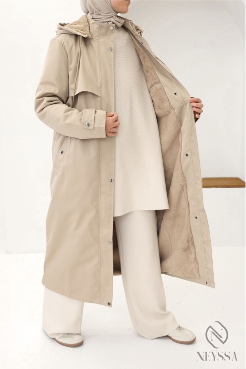Long women's parka with modest hood and fur lining