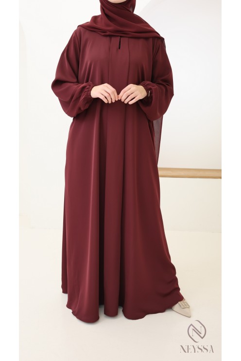 Flared burgundy Dubai abaya with silk pockets by Nidah + hijab