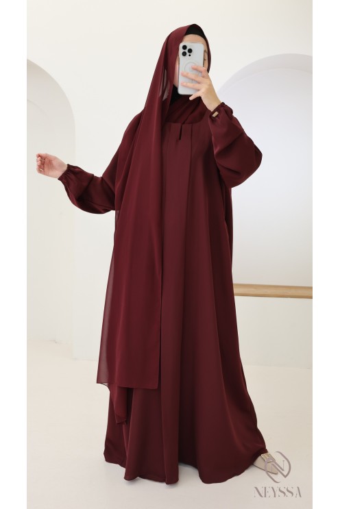 Flared burgundy Dubai abaya with silk pockets by Nidah + hijab