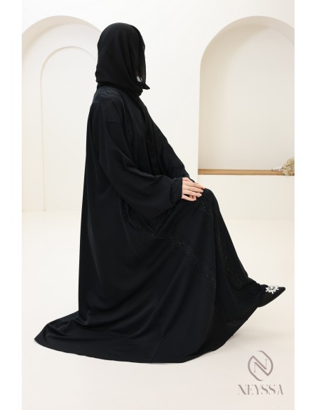 Abaya Dubai schwarz verschleierte Frau mit Perlenstickerei und Strass.