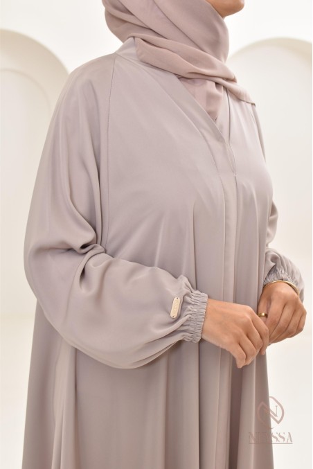 Long nude Dubai abaya for modern veiled women, hijab included