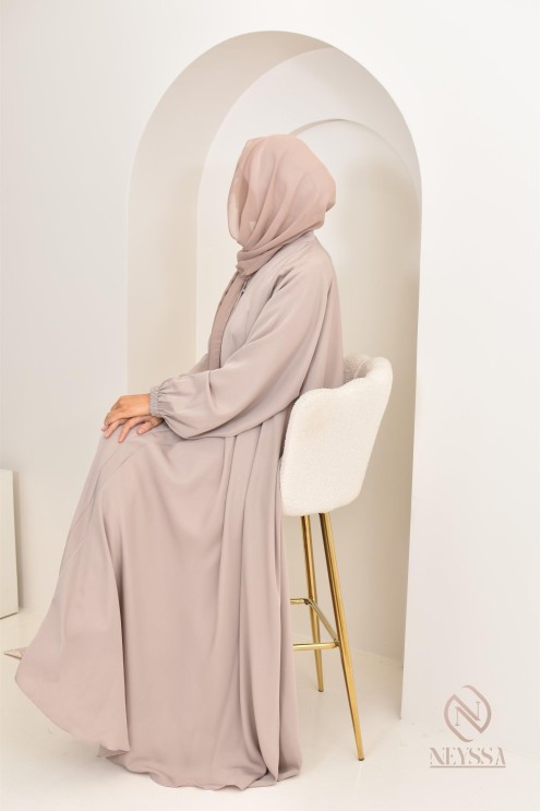 Long nude Dubai abaya for modern veiled women, hijab included