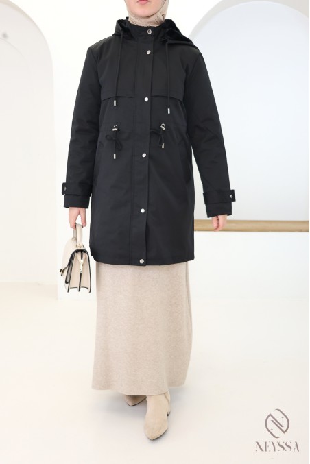 Mid-length women's parka with hood and fur lining.