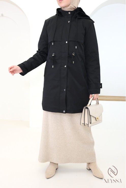 Mid-length women's parka with hood and fur lining.