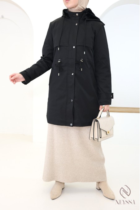 Mid-length women's parka with hood and fur lining.