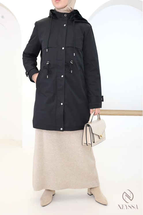 Mid-length women's parka with hood and fur lining.