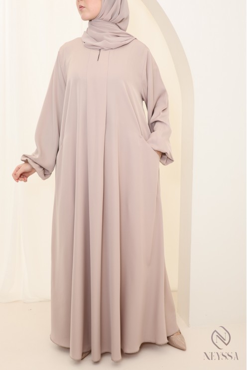 Long nude Dubai abaya for hijabi women, made from luxurious nidah silk