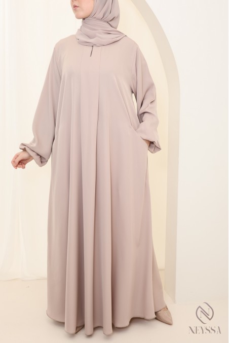 Long nude Dubai abaya for hijabi women, made from luxurious nidah silk