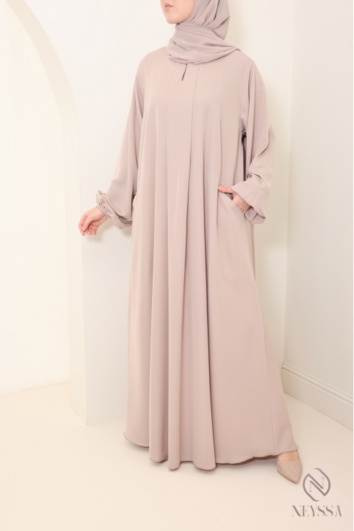 Long nude Dubai abaya for hijabi women, made from luxurious nidah silk