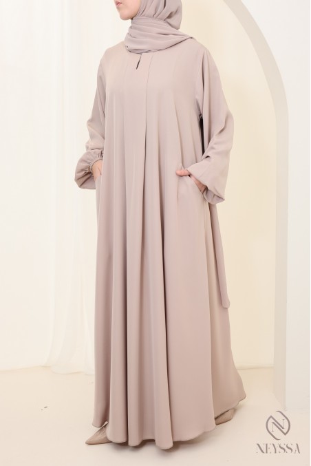 Long nude Dubai abaya for hijabi women, made from luxurious nidah silk