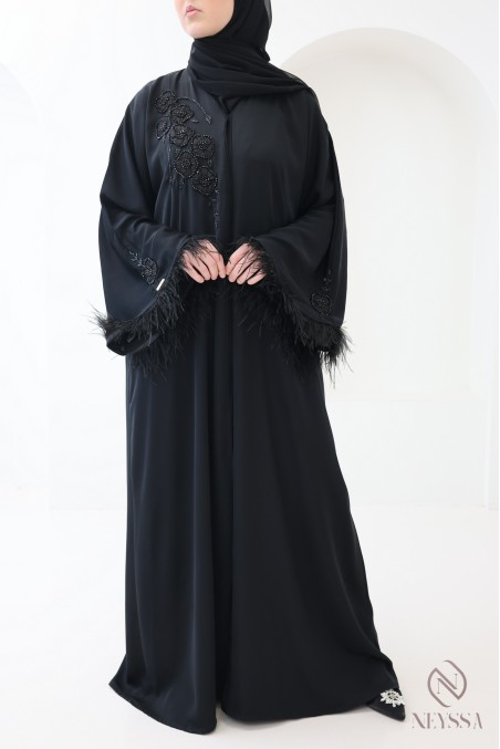 Black Dubai abaya with pearls and feathers, elegant modern cut