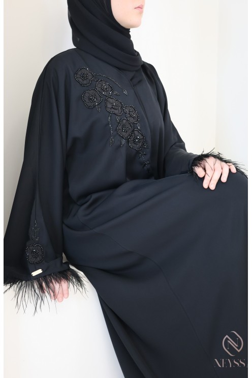 Black Dubai abaya with pearls and feathers, elegant modern cut
