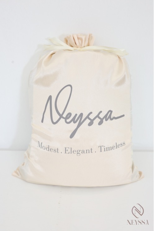 Chic nude Dubai abaya embroidered with luxury pearls, Eid outfit idea