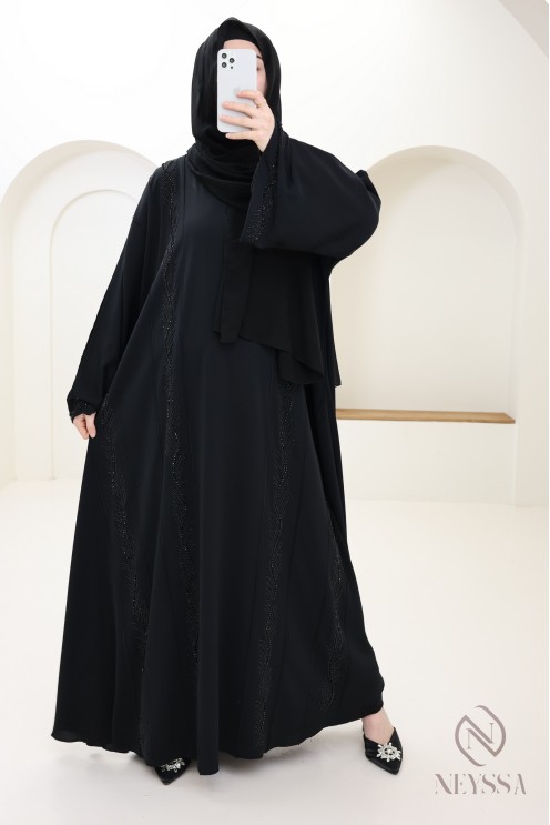 Abaya Dubai schwarz verschleierte Frau mit Perlenstickerei und Strass.