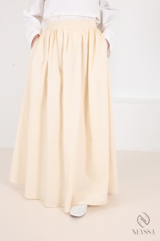 Long beige cotton skirt with a flared cut and lining