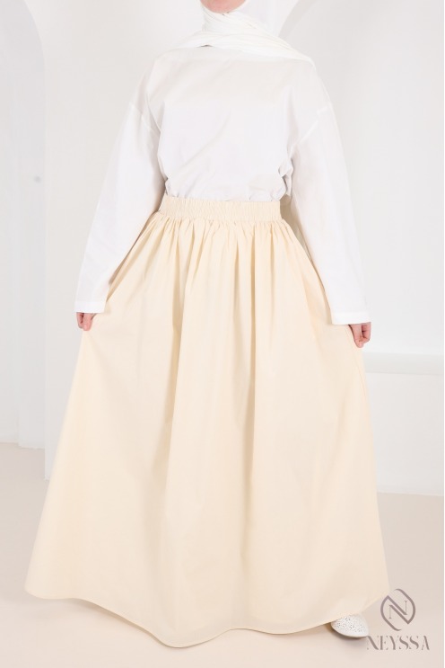 Long beige cotton skirt with a flared cut and lining