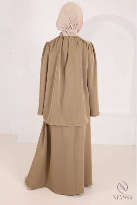 Set featuring a blouse, long skirt, and belt in a flowing taupe
