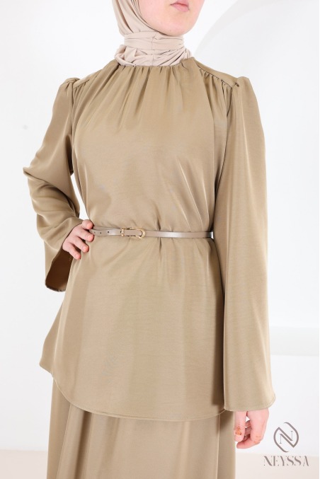 Set featuring a blouse, long skirt, and belt in a flowing taupe