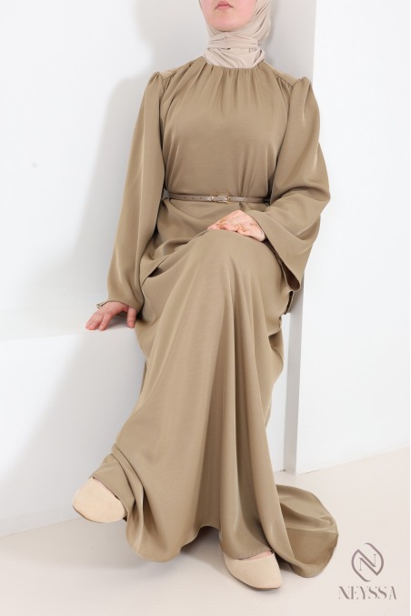 Set featuring a blouse, long skirt, and belt in a flowing taupe