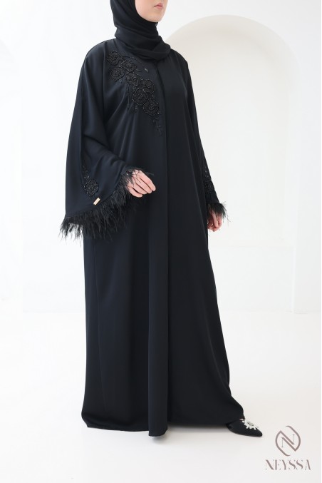 Black Dubai abaya with pearls and feathers, elegant modern cut