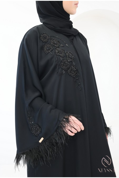 Black Dubai abaya with pearls and feathers, elegant modern cut