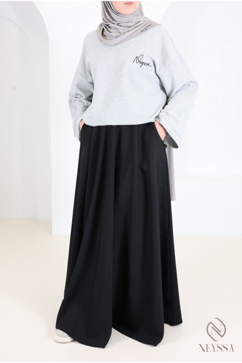 Jupe longue taille haute élastique, tissu crêpe, évasée avec poches