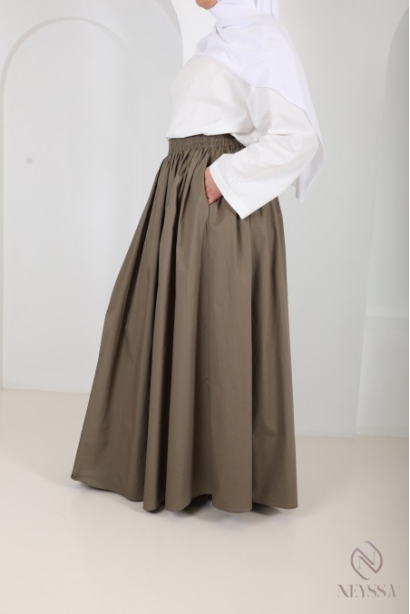 Long beige cotton skirt with a flared cut and lining