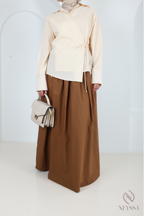 Long beige cotton skirt with a flared cut and lining