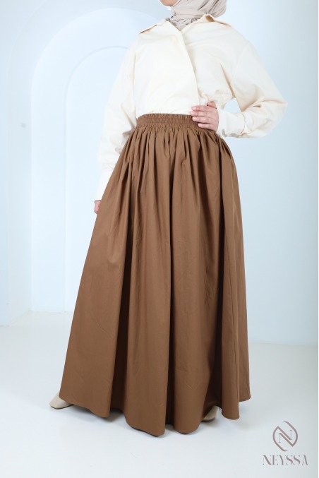 Long beige cotton skirt with a flared cut and lining