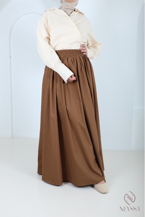 Long beige cotton skirt with a flared cut and lining