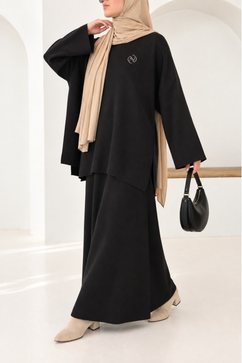 Women's black tunic and long skirt set in woven knit for winter